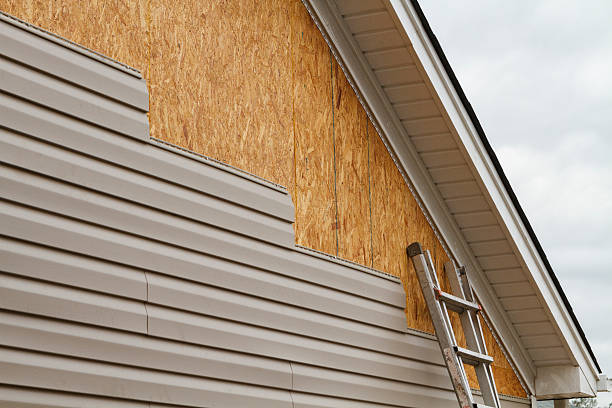 Professional Emergency Siding Repair technician working in Albion, IN